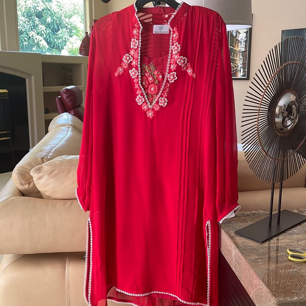 Brand new georgette red embroidered piece. Shirt, slip and pants. 2 piece